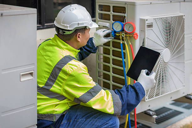 Professional Air Duct Cleaning technician working in Rossville, IN